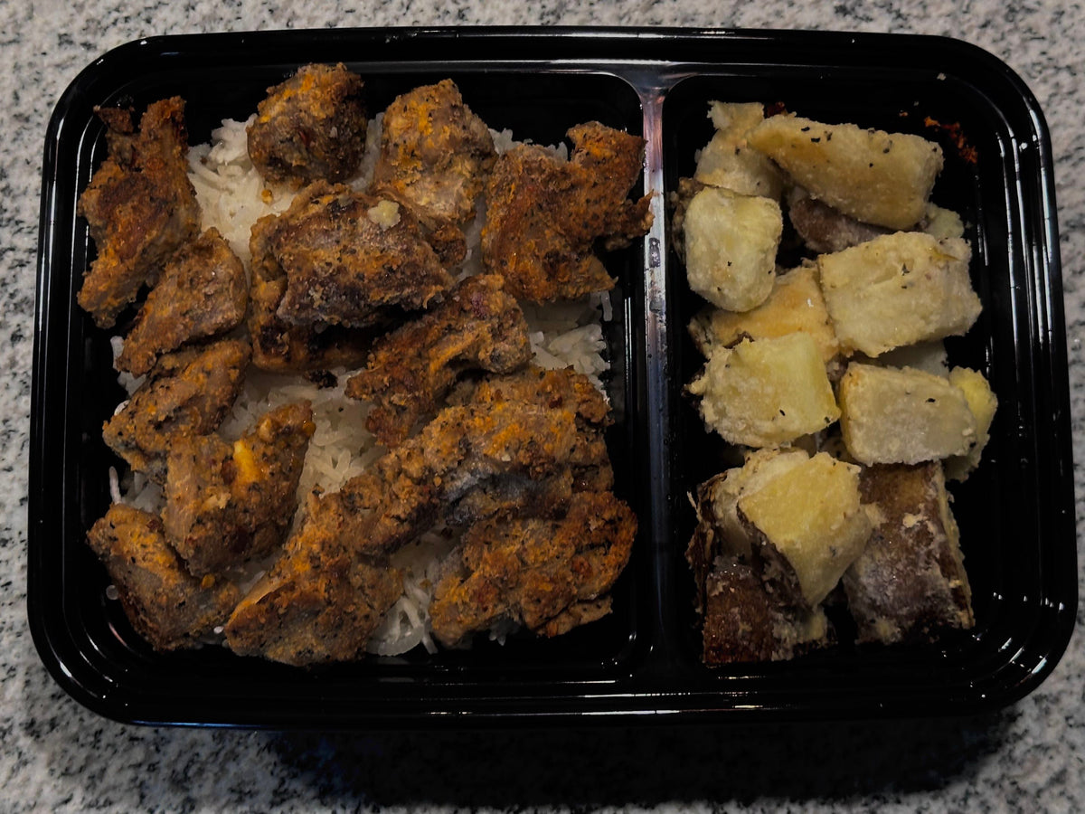 Garlic Chicken with rice and roasted potatoes